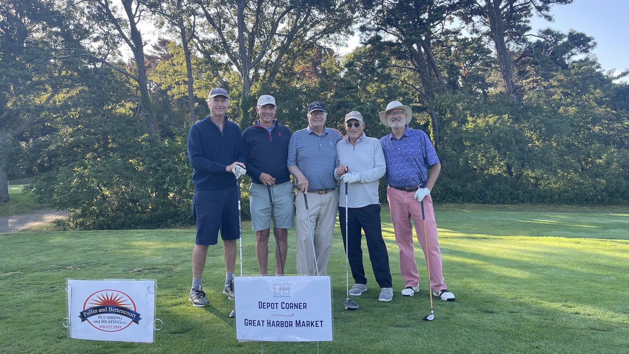 Al Woollaott's team -- one of our golf "Fivesomes" poses at Mink Meadows Golf Club